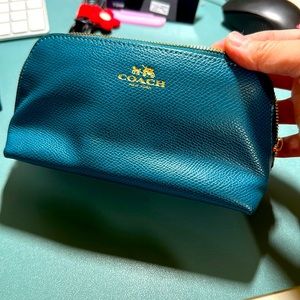 Pre-owen Coach cosmetics case bag green